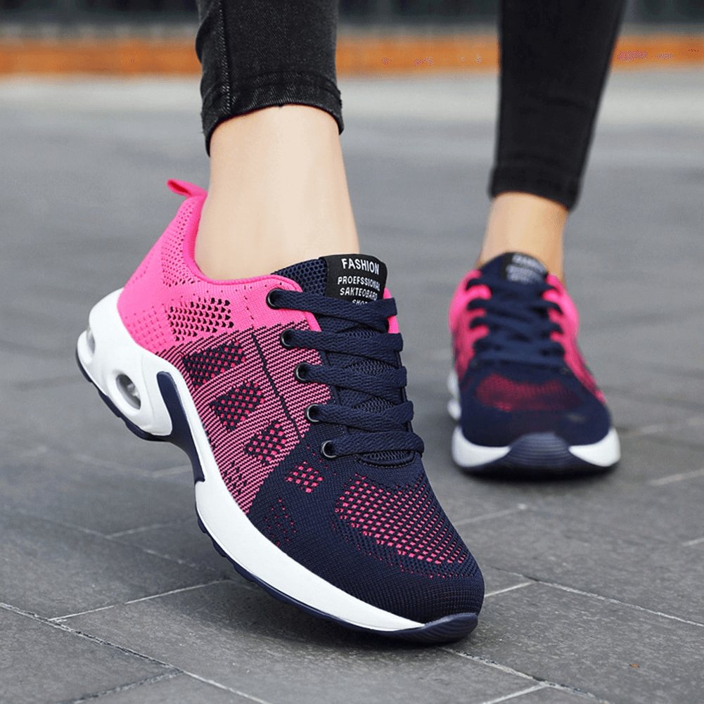 Unisex breathable wear-resistant lace-up running shoes in pink and navy, featuring cushioned rubber outsole and mesh upper